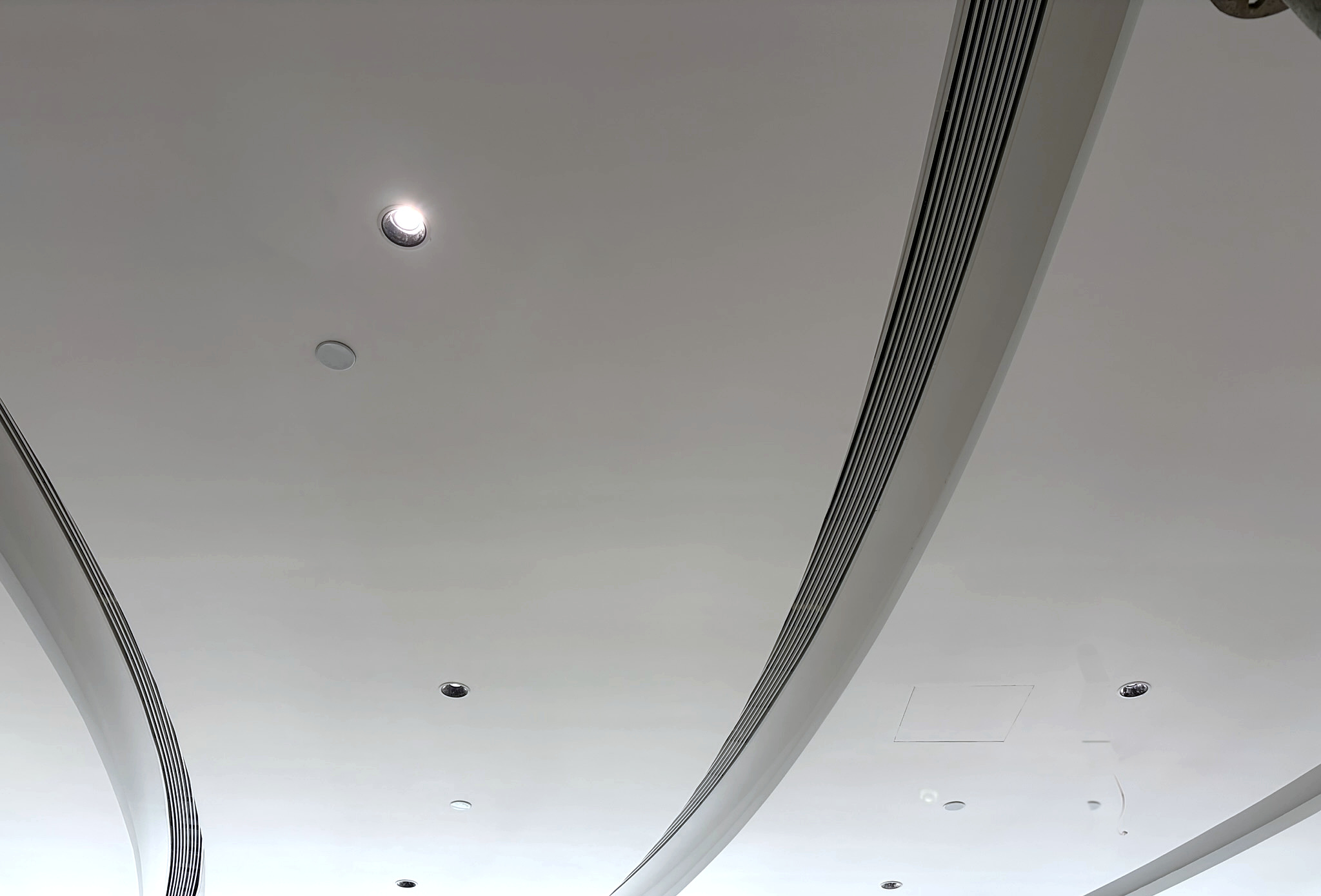 Three independent arcs sharing one ceiling plane