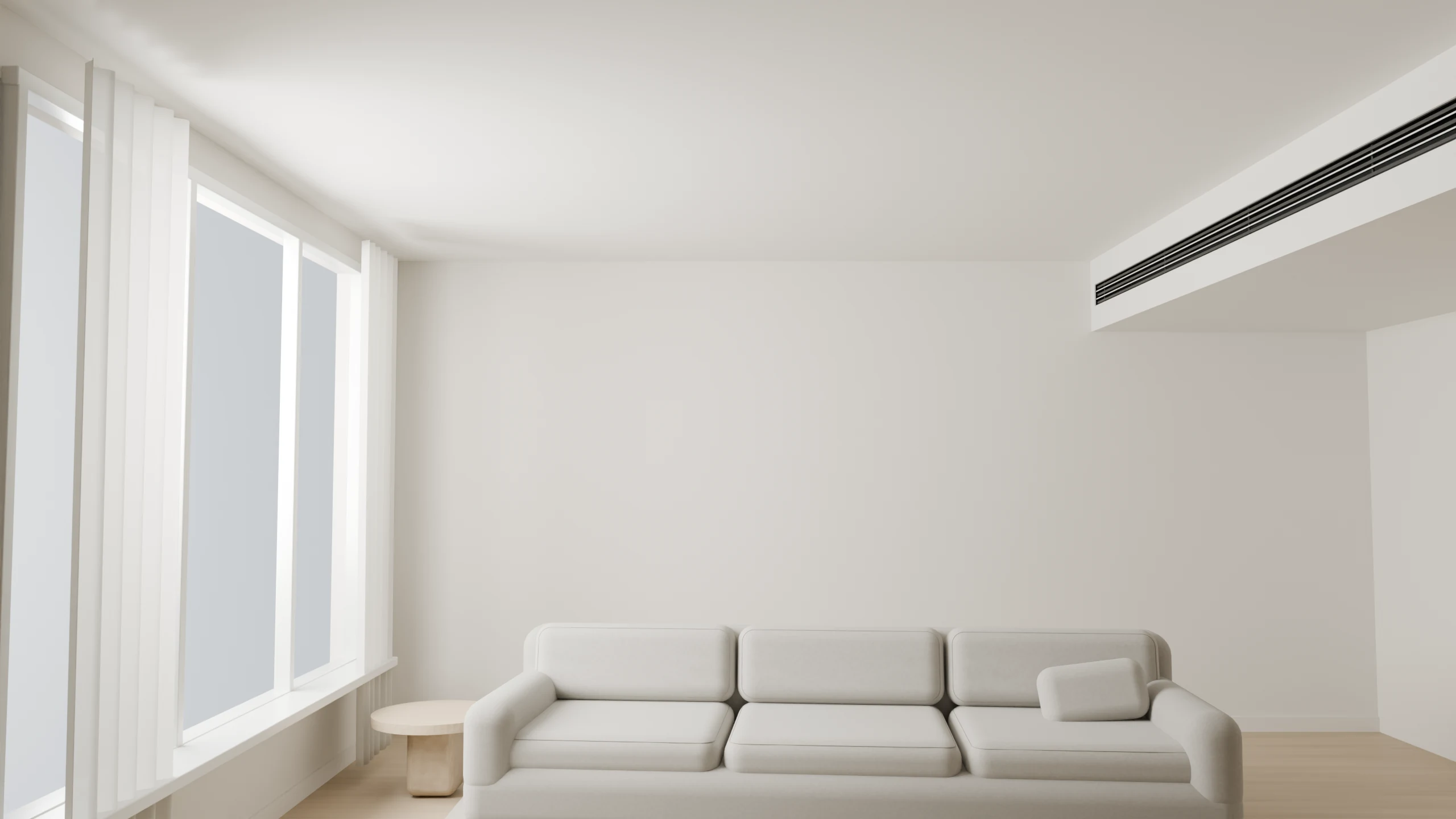 Warm white living room with a long linear air diffuser integrated into the right-hand ceiling fascia.